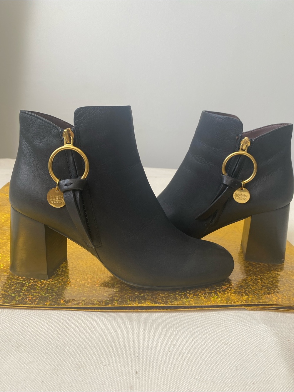 See By Chloé Black Leather Ankle Boots with Gold Rings